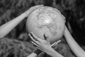 Managing Wealth Across Two Economies